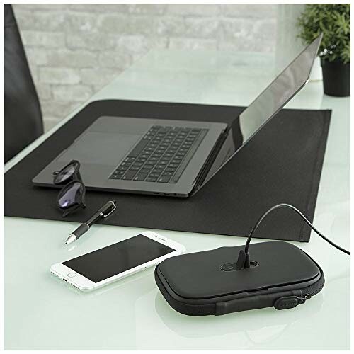 Laptop, smartphone, and sunglasses on a desk