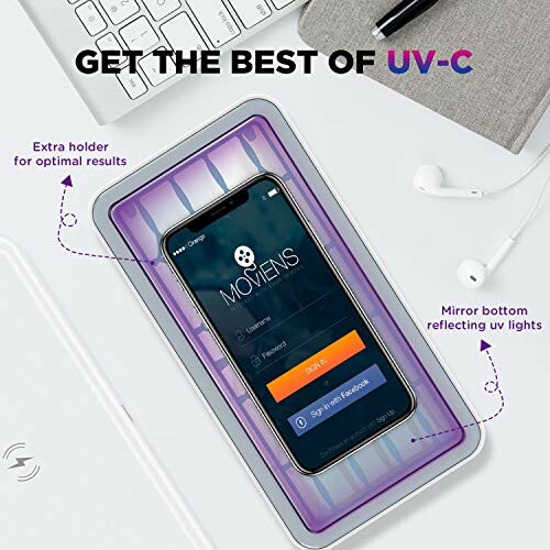 Phone in UV-C sanitizer with headphones nearby.