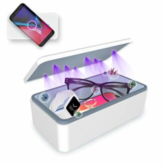 UV light sanitizer box with phone, glasses, watch inside.