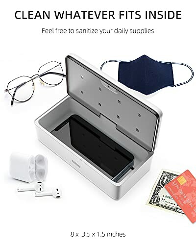 UV sanitizer box with phone, glasses, mask, earbuds, cash, and card.