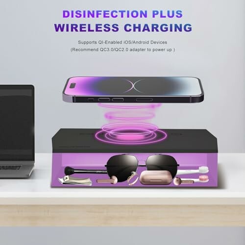 Wireless charging and disinfection device with phone and personal items.